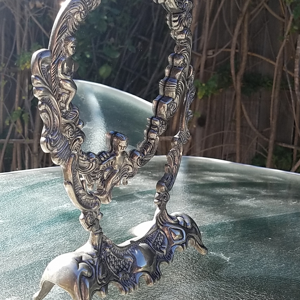 Victorian french shell ornate brass vanity mirror.
